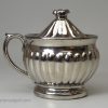 Silver lustre mustard pot and cover, circa 1840