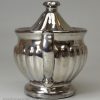 Silver lustre mustard pot and cover, circa 1840