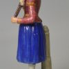 Staffordshire pearlware pottery figure of Madam Vestris playing the Broom Girl, circa 1820