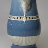 Pearlware pottery jug decorated with blue slip and brown inlay, circa 1800