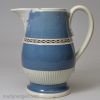 Pearlware pottery jug decorated with blue slip and brown inlay, circa 1800