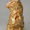 Staffordshire agateware cat with a mouse in it's mouth, circa 1770