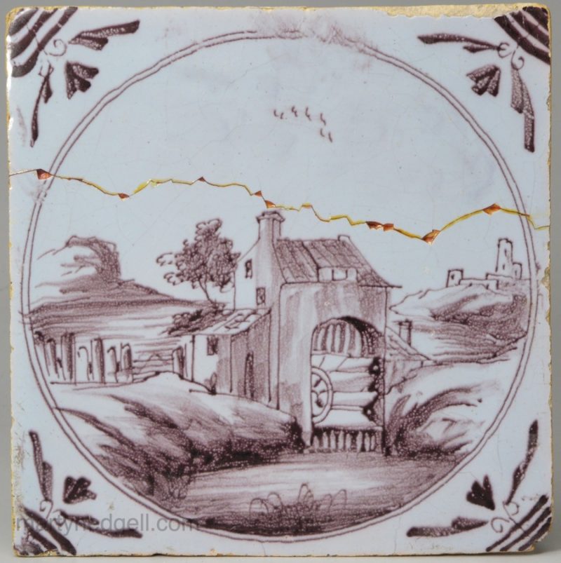 London delft tile painted with a water mill, circa 1750