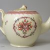 Creamware pottery teapot decorated with overglaze enamels, circa 1780