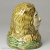 Pearlware pottery lion decorated with colours under the glaze, circa 1800