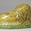 Pearlware pottery lion decorated with colours under the glaze, circa 1800