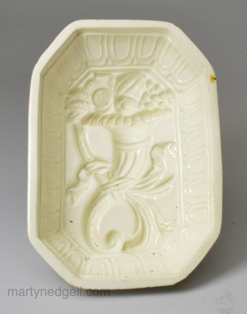 Creamware pottery food mould formed as a cornucopia, circa 1800