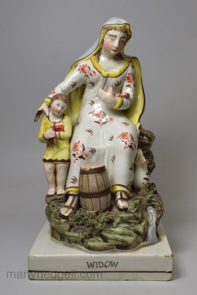 Staffordshire pearlware pottery figure, 'WIDOW', circa 1820