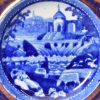 Pearlware pottery cup plate decorated with blue transfer and pink lustre border, circa 1820