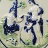 Pearlware pottery plaque moulded with Paris and Aphrodite and coloured under the glaze, circa 1800