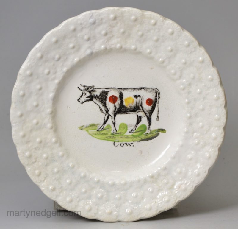 Pearlware pottery child's plate 'COW', circa 1830