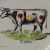 Pearlware pottery child's plate 'COW', circa 1830