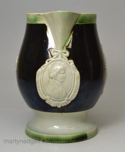 Pearlware pottery commemorative jug, Admiral Rodney, decorated with brown slip and green coloured glaze, circa 1795