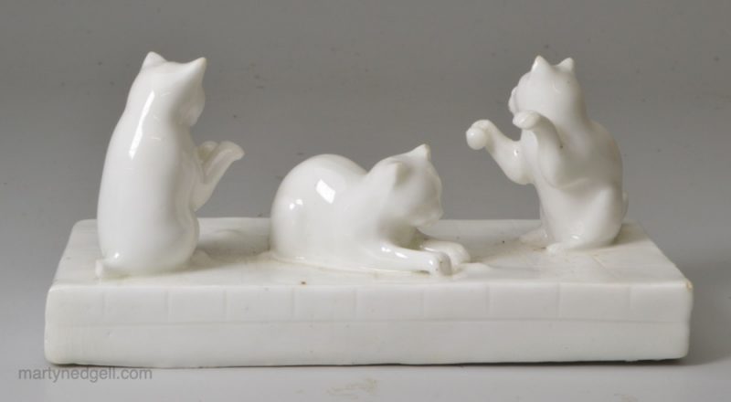 Staffordshire porcelain cat group, circa 1860