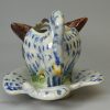 Pearlware pottery fox and goose sauce boat and stand, circa 1790