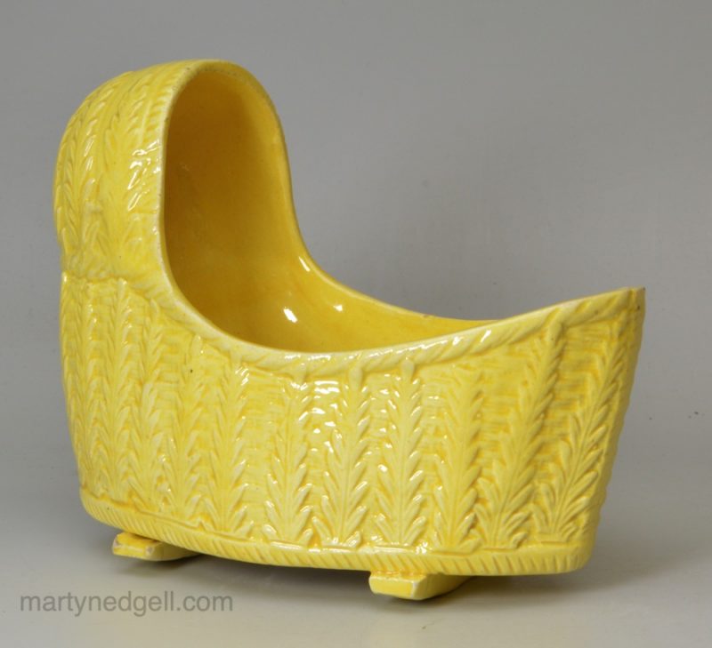 Canary yellow toy cradle, circa 1820