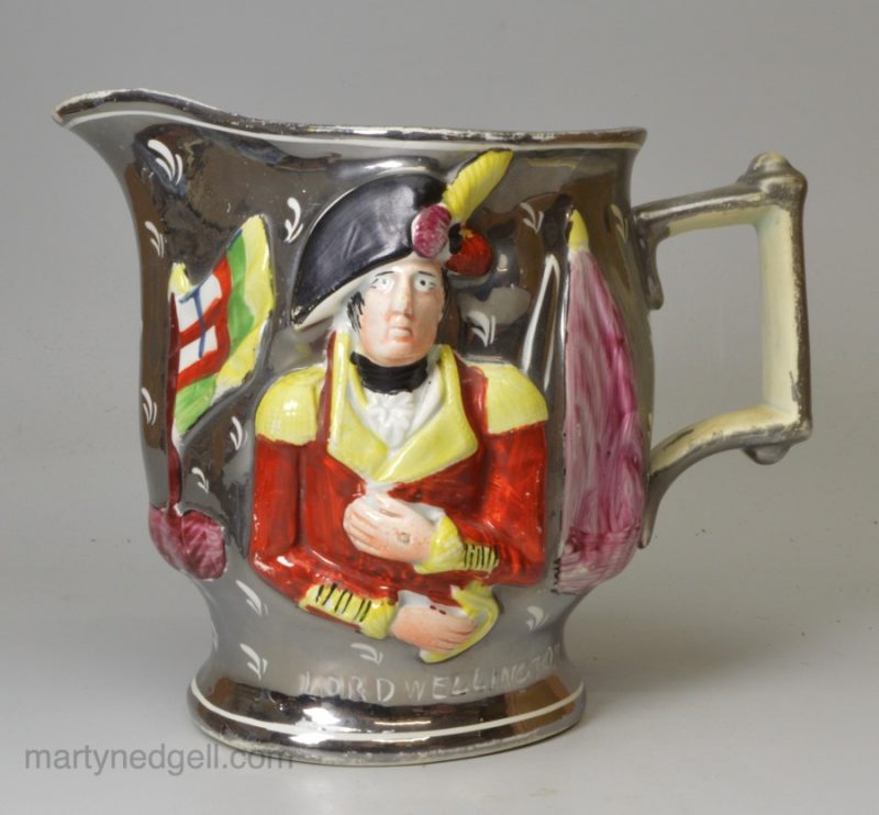 Commemorative silver lustre jug moulded with Lord Wellington and General Hill, circa 1815