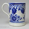 Pearlware pottery mug decorated with blue under the glaze, circa 1820