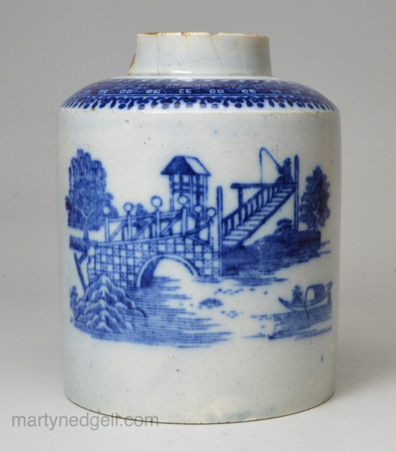 Pearlware pottery tea canister decorated with underglaze transfer prints, circa 1800