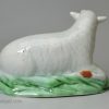 Pearlware pottery sheep, decorated with coloured oxides under the glaze, circa 1790