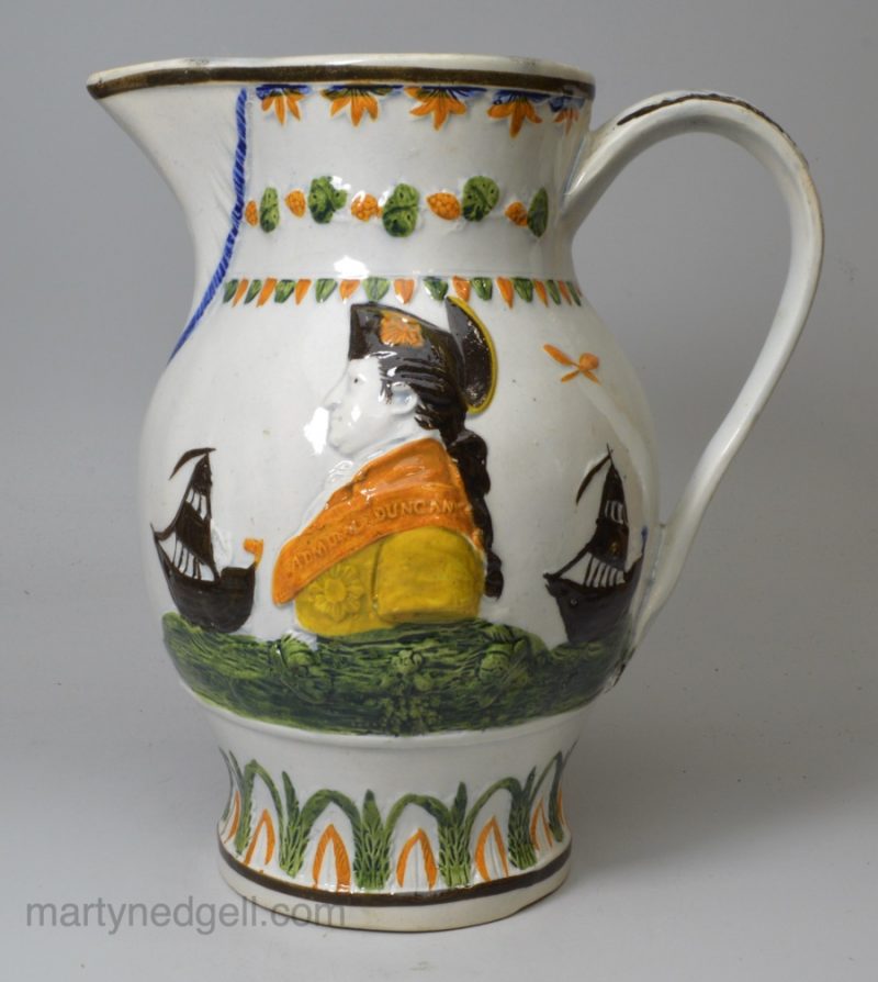 Large commemorative prattware jug moulded with Admiral Duncan, circa 1800