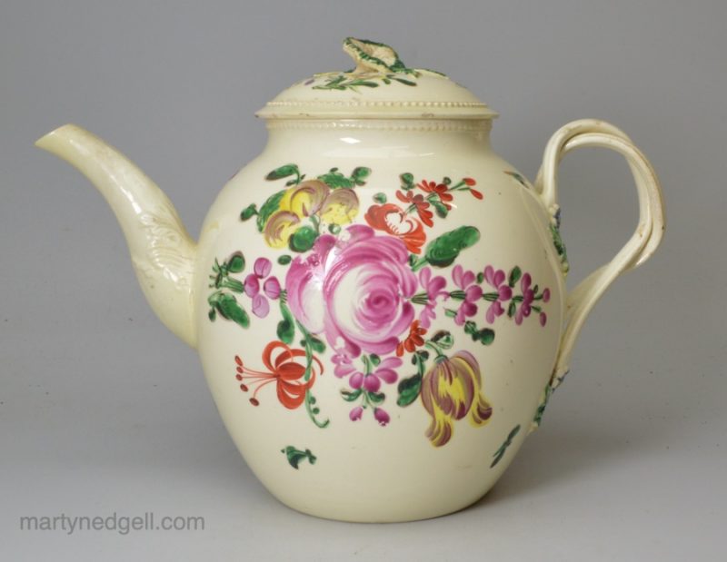 Creamware pottery teapot, enamelled with floral sprays over the glaze, circa 1770, possibly Leeds Pottery