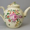 Creamware pottery teapot, enamelled with floral sprays over the glaze, circa 1770, possibly Leeds Pottery