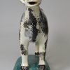 Pearlware pottery cow creamer decorated with enamels under the glaze, circa 1820, Possibly Scottish or North East