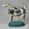 Pearlware pottery cow creamer decorated with enamels under the glaze, circa 1820, Possibly Scottish or North East