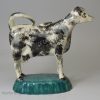 Pearlware pottery cow creamer decorated with enamels under the glaze, circa 1820, Possibly Scottish or North East