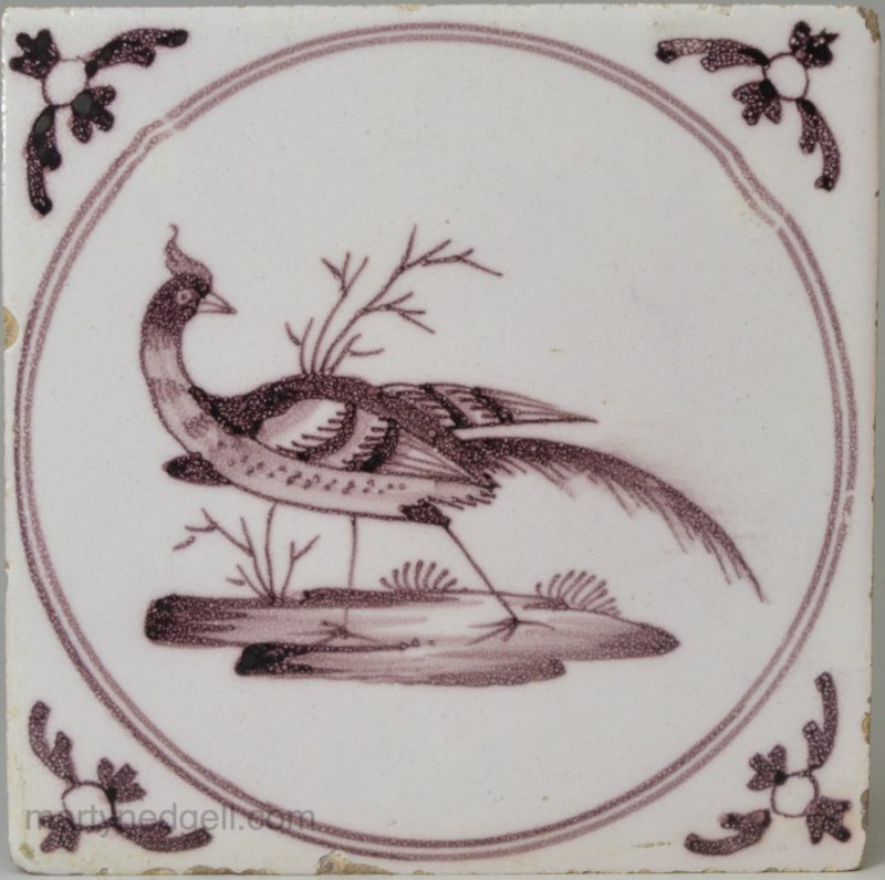 Liverpool delft tile decorated in manganese with a pheasant, circa 1760