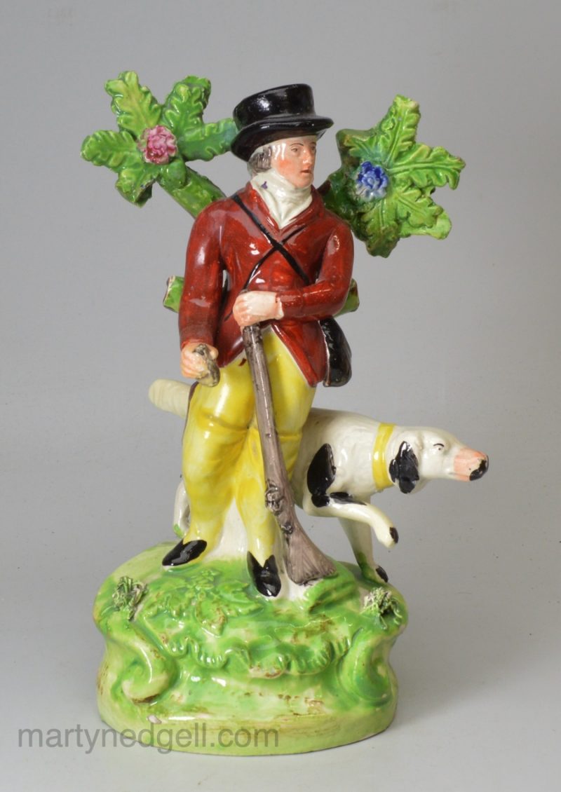 Staffordshire pearlware pottery bocage figure of a sportsman, circa 1820