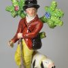 Staffordshire pearlware pottery bocage figure of a sportsman, circa 1820