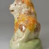 Prattware pottery lion decorated with coloured oxides under a pearlware glaze, circa 1820