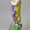 Staffordshire pearlware pottery figure of plenty, circa 1810