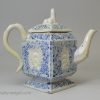 Staffordshire white salt glaze stoneware teapot decorated with blue inlaid into the pattern, circa 1750