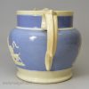 Pearlware pottery jug decorated with blue slip and applied sprigs, circa 1830