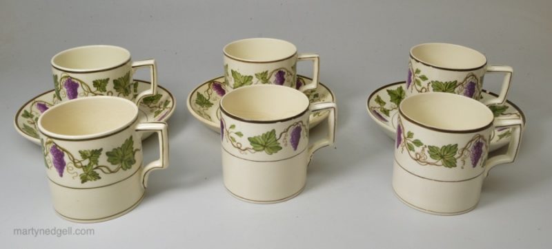 Set of six creamware pottery coffee cups and three saucers made by Wedgwood for James Powell & Sons Whitefriars Glass Works London, circa 1895