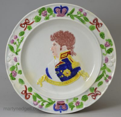 Pearlware pottery plate moulded with King George IV to commemorate hisvisit to Scotland after his Coronation in 1822, Scottish Pottery