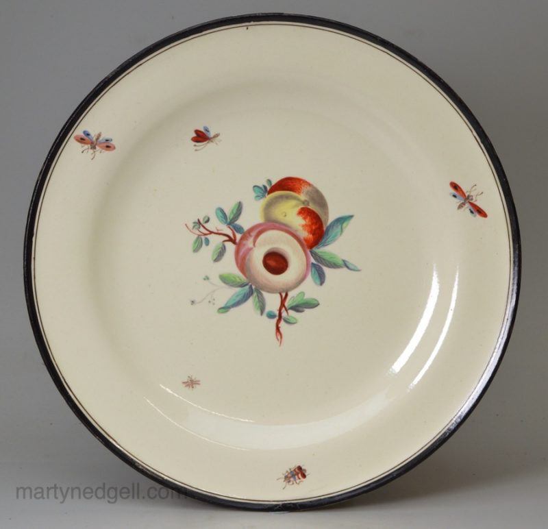 Creamware pottery plate painted with fruit, circa 1790