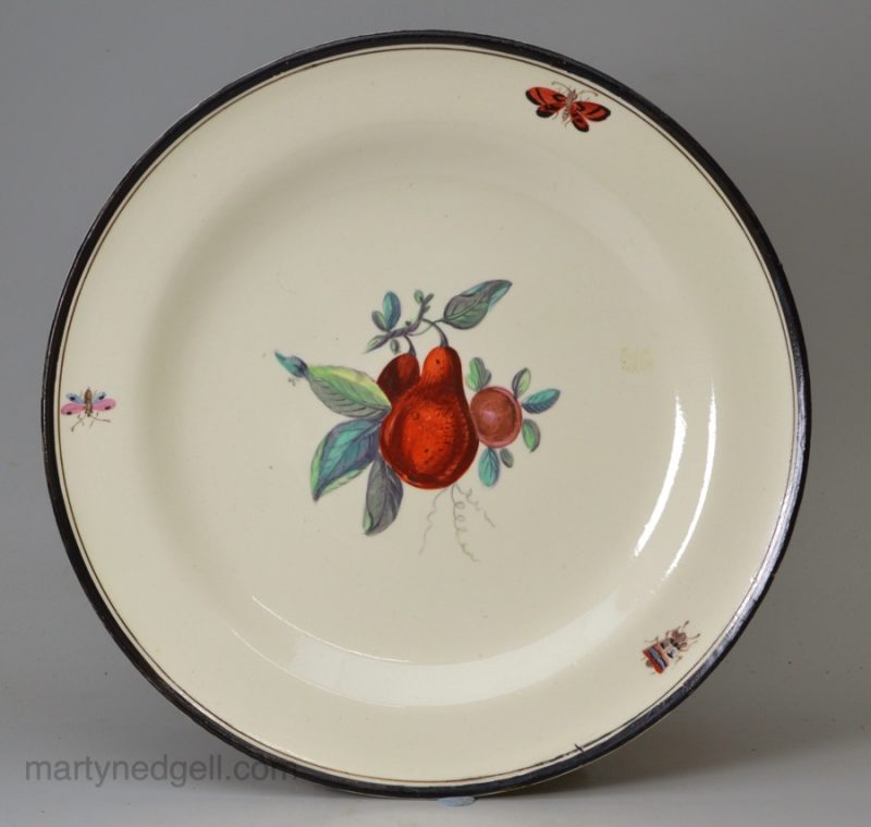 Creamware pottery plate painted with fruit, circa 1790