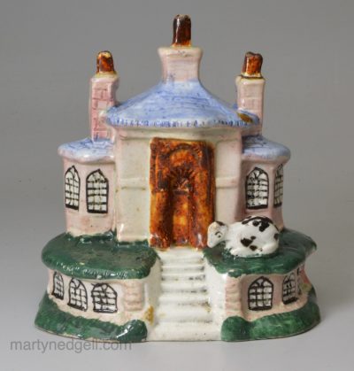 Pearlware pottery cottage decorated with underglaze enamels, circa 1830, possibly Scottish or North East Pottery