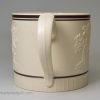 Stoneware mug decorated with classical sprigs, circa 1820, possibly Turner