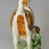 Pearlware pottery cow creamer decorative with oxides under the glaze, circa 1820