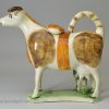 Pearlware pottery cow creamer decorative with oxides under the glaze, circa 1820