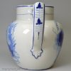 Rare syphoning pearlware pottery commemorative puzzle jug with blue prints of Napoleon and Wellington under the glaze, circa 1815