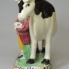 Prattware pottery cow group, circa 1820, Yorkshire pottery type