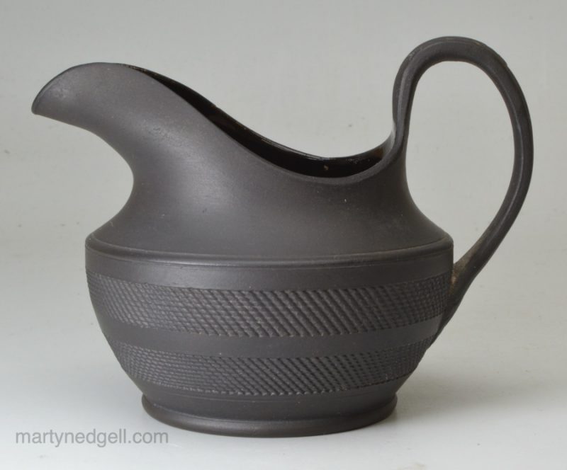 Black basalt cream jug, circa 1820