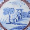 London delft tile decorated with a manganese ground, circa 1750