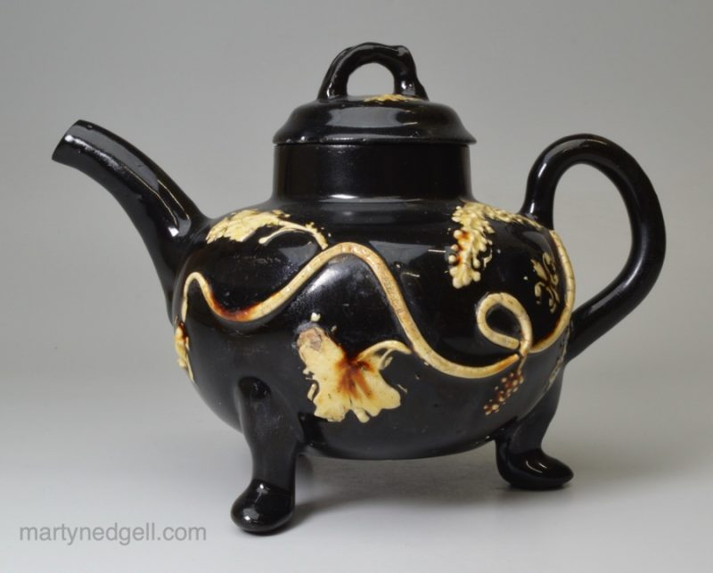 Staffordshire black glazed and sprigged pipe clay decoration, circa 1760